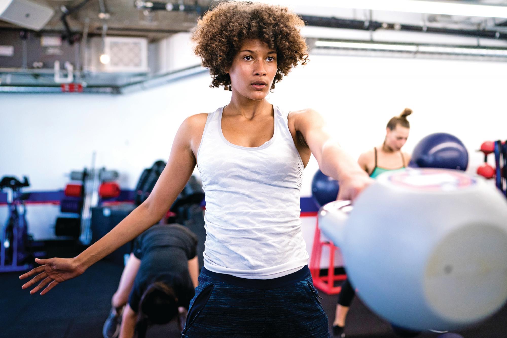 Woman working out with kettlebell